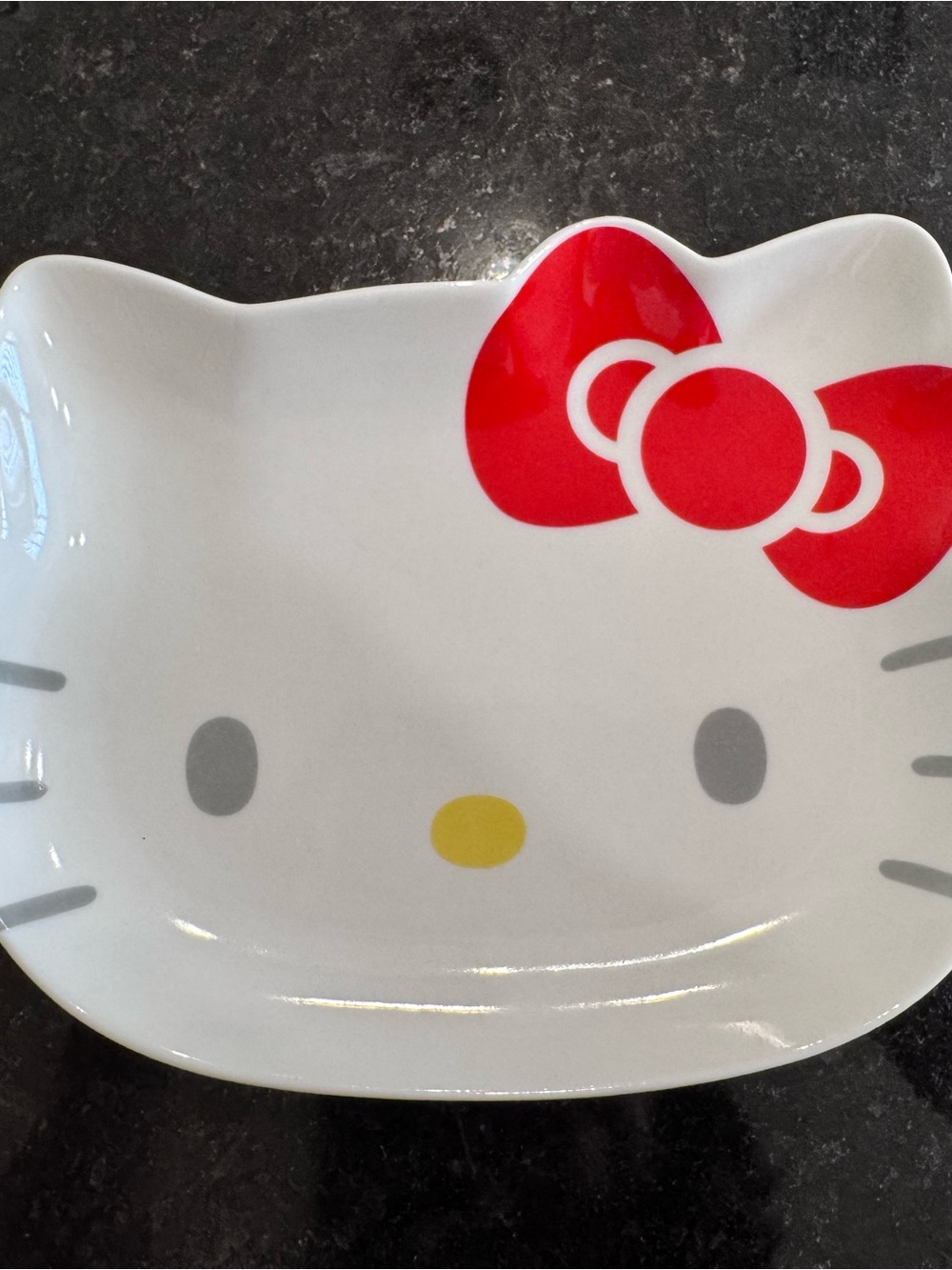 HELLO KITTY Sanrio 2008 Ceramic Face-Shaped Plate is a 7”x6.5” collector plate